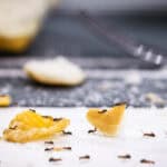 ants on dirt and bread crumbs on the table, insect infestation in the kitchen, need for detection