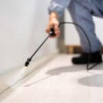 Pest Control Exterminator Man Spraying Pesticide